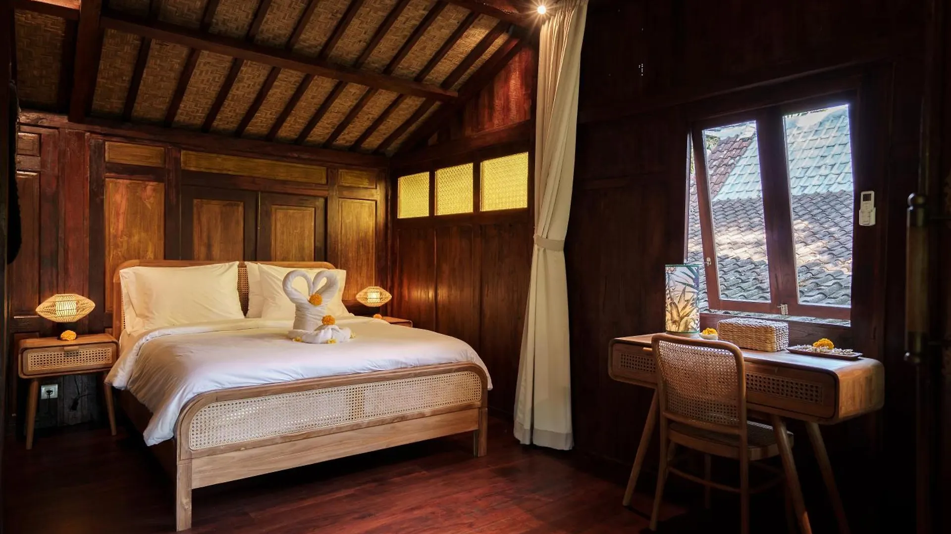 Tropical Traditional Indonesian Wooden Cottage In Ubud